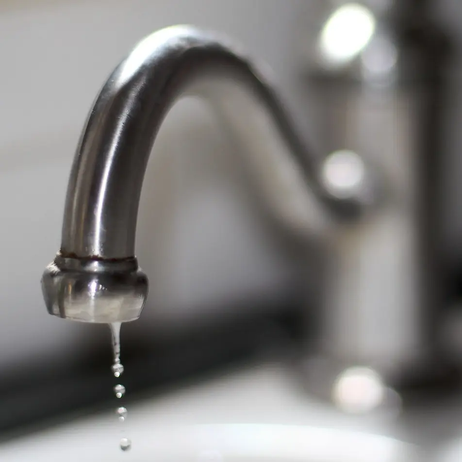 Chrome faucet with running water